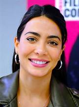 Discover the Secret to Emeraude Toubia's Commanding Presence: Unlocking Her Height's Impact